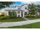 Two-story home with stone accents and a landscaped yard at 13022 Payton St, Odessa, FL 33556