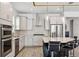 Modern kitchen with stainless steel appliances and an island at 13022 Payton St, Odessa, FL 33556