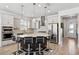 Modern kitchen featuring a large island and stainless steel appliances at 13022 Payton St, Odessa, FL 33556