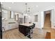 Modern kitchen with stainless steel appliances and an island at 13022 Payton St, Odessa, FL 33556