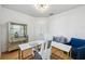 Bright home office with a large desk and comfortable chair at 13022 Payton St, Odessa, FL 33556