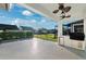 Outdoor kitchen area with built-in grill and mini-fridge at 13022 Payton St, Odessa, FL 33556