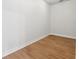 Empty spare bedroom with light wood laminate flooring and white walls at 13022 Payton St, Odessa, FL 33556