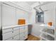 Spacious walk-in closet with ample shelving and drawers at 13022 Payton St, Odessa, FL 33556