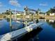 Private boat lift with dock access at 1354 Linstock Dr, Holiday, FL 34690