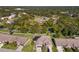 Residential homes with solar panels, aerial view at 1400 Summerwood Ct, Spring Hill, FL 34606