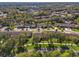Community overview showcasing homes and landscaping at 1400 Summerwood Ct, Spring Hill, FL 34606