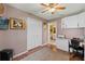 Bedroom with home office and access to bathroom at 1400 Summerwood Ct, Spring Hill, FL 34606