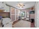 Multi-functional bedroom with a built-in murphy bed and office space at 1400 Summerwood Ct, Spring Hill, FL 34606