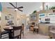 Bright dining area with a round table, six chairs, and an open concept design at 1400 Summerwood Ct, Spring Hill, FL 34606