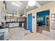Modern kitchen with white cabinetry, granite countertops, and stainless steel appliances at 1400 Summerwood Ct, Spring Hill, FL 34606