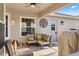 Relaxing patio area with seating and grill at 1400 Summerwood Ct, Spring Hill, FL 34606