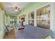 Peaceful sunroom with ample natural light and comfortable seating at 1400 Summerwood Ct, Spring Hill, FL 34606