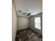 Spacious bedroom with wood-look floors and ceiling fan at 1925 Patriot Ln, Holiday, FL 34690