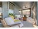 Outdoor patio with seating area, string lights, and ceiling fan at 19907 Tattnall Way, Brooksville, FL 34601