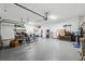 Garage with bikes, storage shelves, and overhead storage at 19907 Tattnall Way, Brooksville, FL 34601