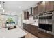 Stylish kitchen with stainless steel appliances and ample counter space at 19907 Tattnall Way, Brooksville, FL 34601