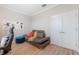 Spacious office with leather couch and built-in shelving at 19907 Tattnall Way, Brooksville, FL 34601