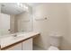 Clean bathroom with vanity, toilet and mirrored medicine cabinet at 2347 Lema Dr, Spring Hill, FL 34609