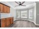 Bright breakfast nook with wood cabinets and large windows at 2468 Magellan Ave, Spring Hill, FL 34608