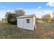 Small shed in a grassy backyard area at 3351 Lambert Ave, Spring Hill, FL 34608