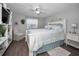 Main bedroom with a queen-size bed and built-in shelving at 4229 Rax Pl # 4229, New Port Richey, FL 34652