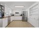 Modern kitchen with stainless steel appliances and wood countertops at 5013 Tammy Ln, Holiday, FL 34690