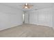 Bedroom with double door closet and ceiling fan at 5127 Baldock Ave, Spring Hill, FL 34608