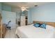 Spacious Primary bedroom with access to the bathroom and a ceiling fan at 6604 Rosemont Ct, New Port Richey, FL 34655