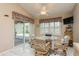Breakfast nook with view of the pool and backyard at 6604 Rosemont Ct, New Port Richey, FL 34655