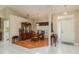 Formal dining room with wooden table and hutch at 6604 Rosemont Ct, New Port Richey, FL 34655