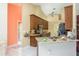 Kitchen with granite countertops, wood cabinets, and stainless steel appliances at 6604 Rosemont Ct, New Port Richey, FL 34655