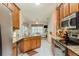 Kitchen with granite countertops and stainless steel appliances at 6604 Rosemont Ct, New Port Richey, FL 34655