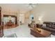 Open concept living room with adjacent dining area at 6604 Rosemont Ct, New Port Richey, FL 34655