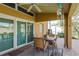 Screened patio with pool view and outdoor furniture at 6604 Rosemont Ct, New Port Richey, FL 34655