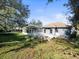 Large backyard with patio, fire pit and trampoline at 10307 Ridge Top Loop, Weeki Wachee, FL 34613