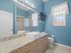 Bathroom with single sink, granite countertop, and updated fixtures at 10307 Ridge Top Loop, Weeki Wachee, FL 34613