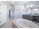 Spacious bathroom with soaking tub and double vanity at 10307 Ridge Top Loop, Weeki Wachee, FL 34613