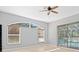 Spacious bedroom with pool view and large windows at 10307 Ridge Top Loop, Weeki Wachee, FL 34613