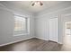 Bedroom featuring wood-look floors and ceiling fan at 10307 Ridge Top Loop, Weeki Wachee, FL 34613