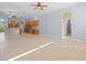Open kitchen features ample cabinetry, tile flooring and breakfast bar at 10307 Ridge Top Loop, Weeki Wachee, FL 34613