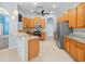 Kitchen boasts wood cabinets, granite counters and stainless steel appliances at 10307 Ridge Top Loop, Weeki Wachee, FL 34613
