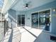 Sliding doors open to the pool and patio area at 10307 Ridge Top Loop, Weeki Wachee, FL 34613