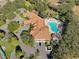 Aerial view of community pool and clubhouse at 11445 Deercroft Ct, Spring Hill, FL 34609