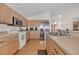 Modern kitchen with stainless steel appliances and wood cabinets at 11445 Deercroft Ct, Spring Hill, FL 34609