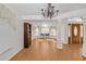 Bright and spacious living area with hardwood floors and large windows at 11445 Deercroft Ct, Spring Hill, FL 34609