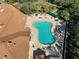 Resort-style pool with plenty of lounge chairs at 11445 Deercroft Ct, Spring Hill, FL 34609