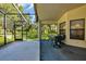 Screened porch overlooks the backyard at 11445 Deercroft Ct, Spring Hill, FL 34609