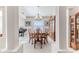 Formal dining room with a wooden table, chairs, and china cabinet at 11544 Mcleod St, Spring Hill, FL 34609