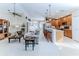 Modern kitchen boasts wooden cabinets, stainless steel appliances, and a breakfast bar at 11544 Mcleod St, Spring Hill, FL 34609
